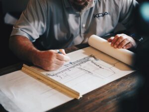 man reading a blueprint